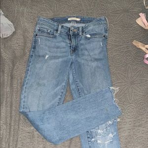 Ripped Light Wash Levis